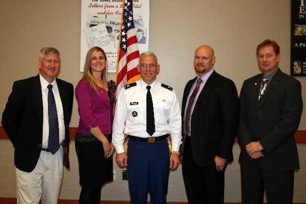 Gathering at the February luncheon are (l-r) John Jarvis, chapter vice president; Pam Plesz, secretary; Col. Charles Grindle, USA, faculty instructor at the U.S. Army War College; John Snider, chapter president; and Patrick O'Brien, treasurer.